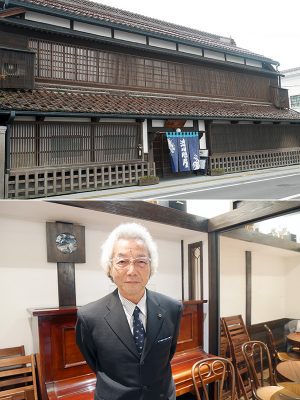 写真上:七日町駅前に佇む「渋川問屋」。明治に建てられたもので、外観がそのまま残っている。当時海産物を会津一円へと運ぶ問屋として栄えた。今は郷土料理を振る舞う飲食店と宿泊施設になっている。店舗の改修などは渋川氏によるものだ<br>
写真下:七日町通りまちなみ協議会 会長の渋川恵男氏