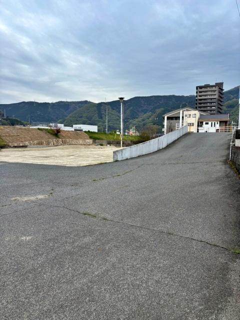 府中町(南)信号南側空き地【備後国府まつり：12:00〜22:00】の駐車場写真