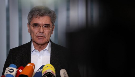 Elderly CEO addresses the press