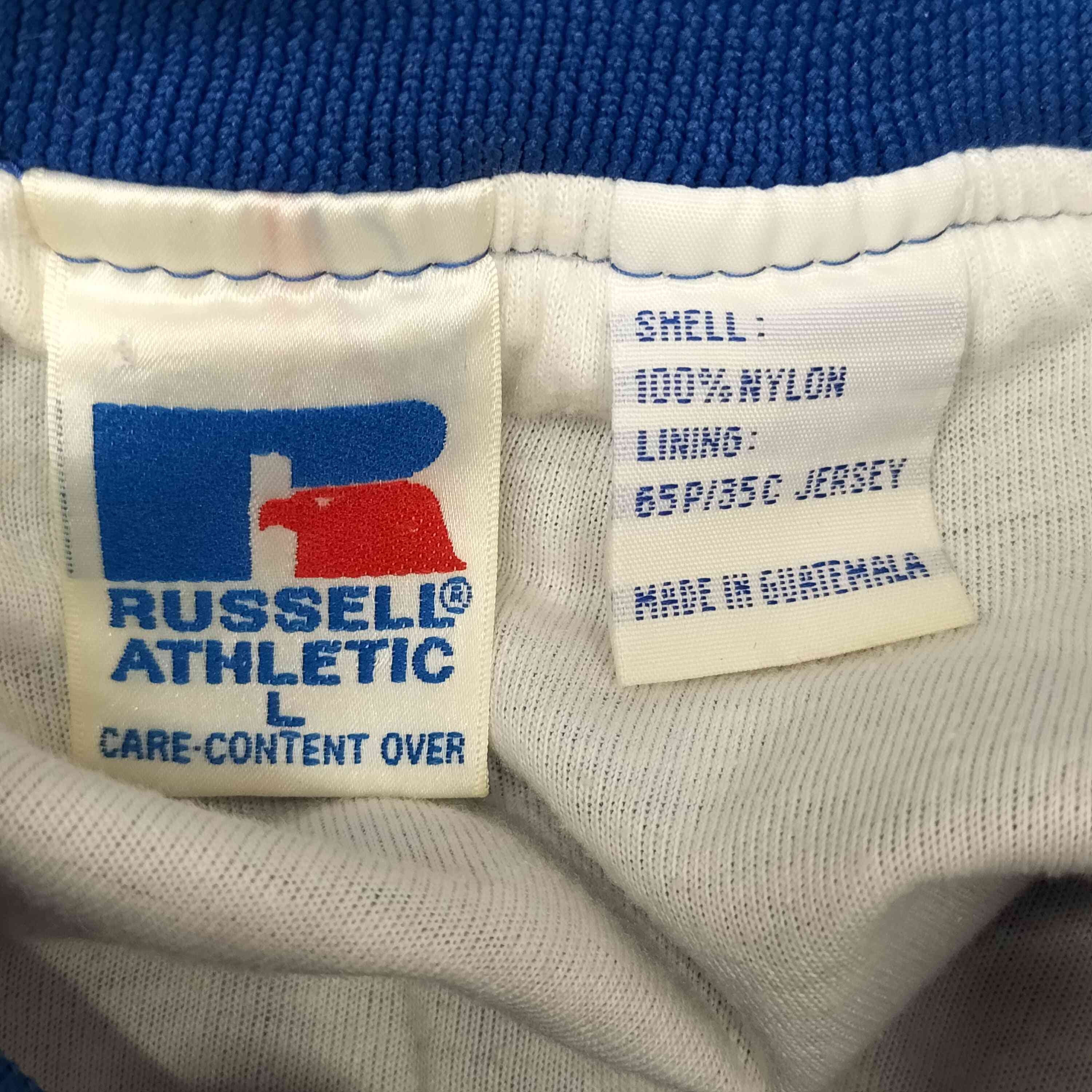 RUSSELL ATHLETIC(ラッセルアスレチック)90S ナイロンプルオーバー 裾ジップ ピステ 【中古】【ブランド古着バズストア