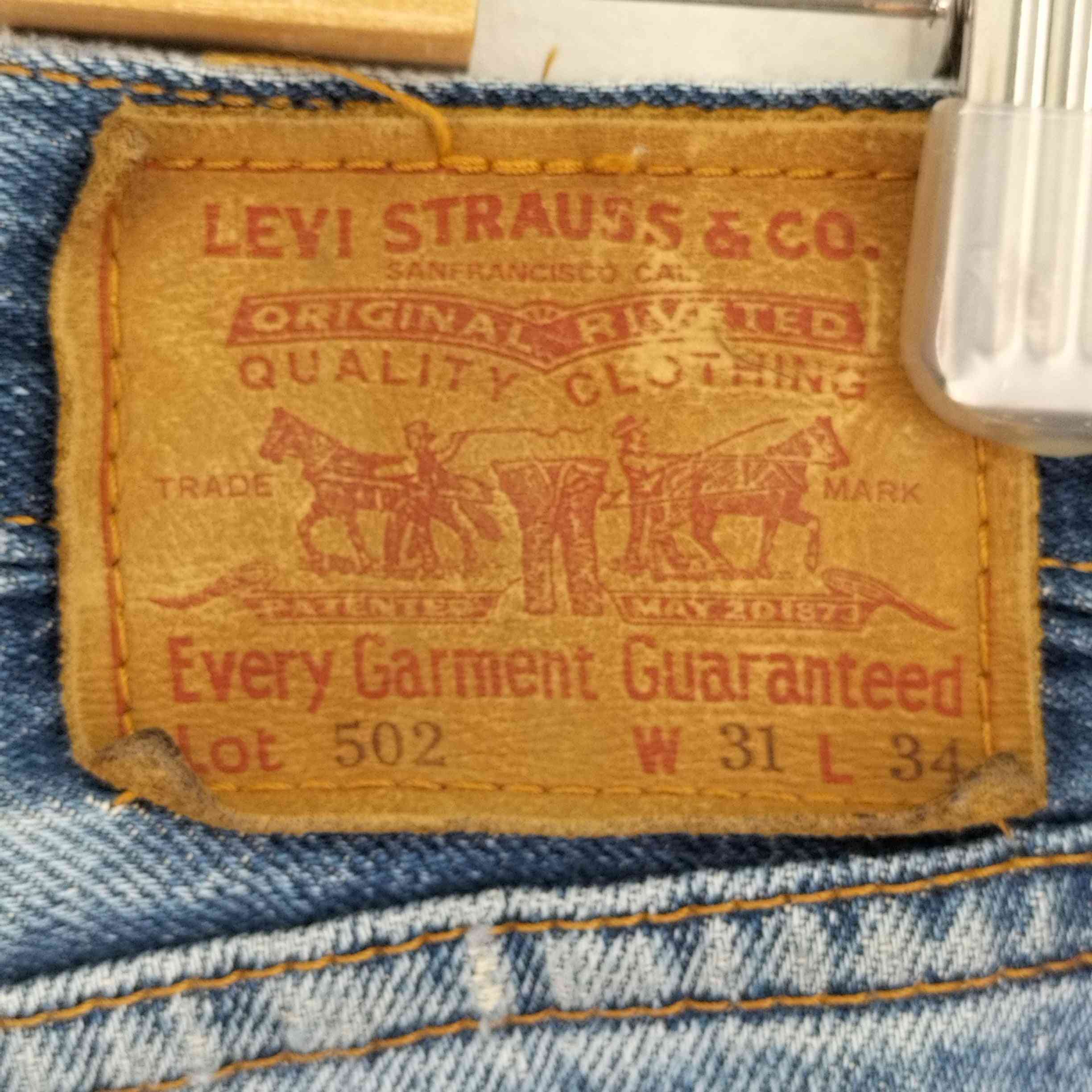 Levis(リーバイス)90S 502 日本製 ダメージデニムパンツ 【中古 