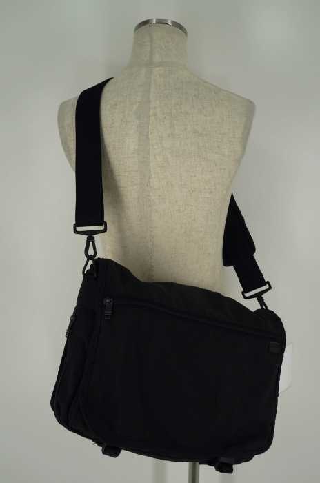 ALPHA コンパクト・スリング リフレクティブ T-ジャカード ｜TUMI