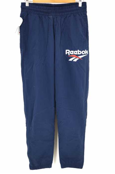Reebok （リーボック） Vector Logo Joggers  ロゴプリントナイロントラックパンツ メンズ パンツ