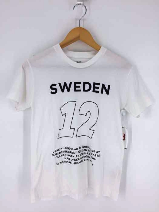 foot the coacher（フットザコーチャー） SWEDEN THE STRANGE NUMBER TEE レディース トップス