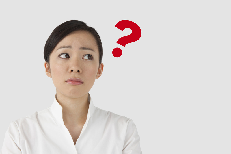 ？を浮かべている女性