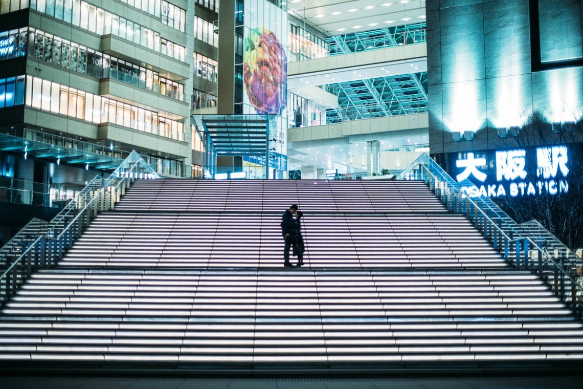 On the stairs of Osaka Station — Photo by GQ wedding photojournalism