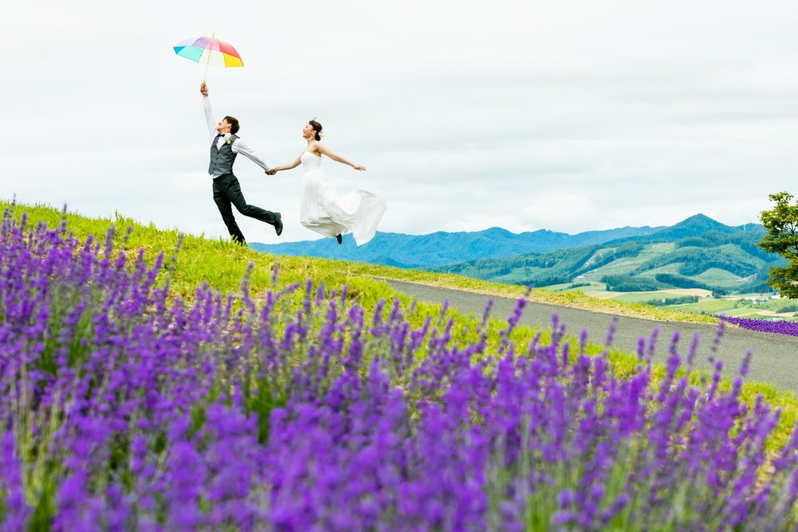 Couple in Furano, Hokkaido floating away — Photo by Lykke photo style