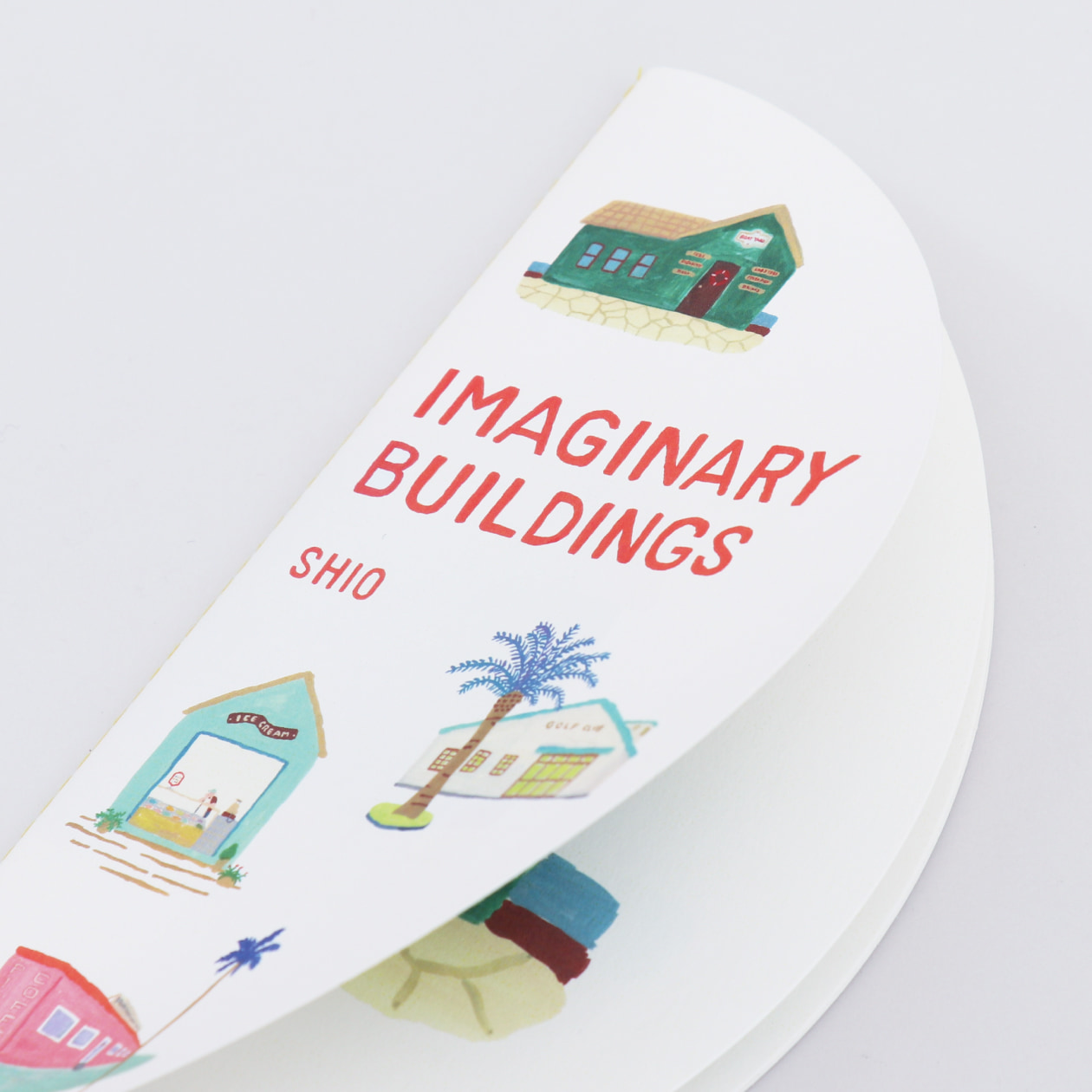 双眼鏡で覗いているような形状の冊子（Cotton スノーホワイト）