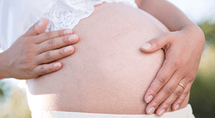 妊婦のお腹,妊娠,出血,びらん