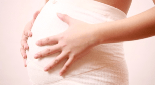 お腹が妊婦,妊娠後期,腰痛,改善