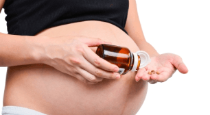 錠剤の音を聞かせる妊婦,妊娠初期,飲酒,影響
