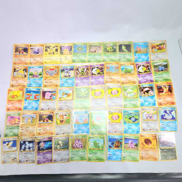 Old back Pokémon cards, approx. 133 cards in a set, trainer cards Energy 25E North E2