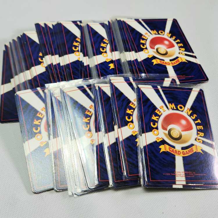 Old back Pokémon cards, approx. 133 cards in a set, trainer cards Energy 25E North E2