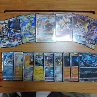 16 Pokémon cards, including RR R