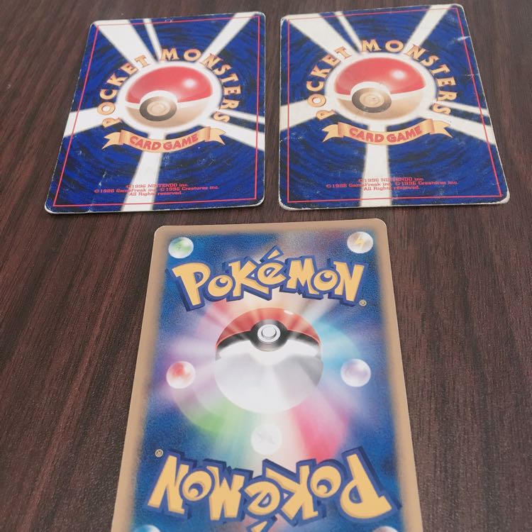 Two old Pokemon cards Natu and one other