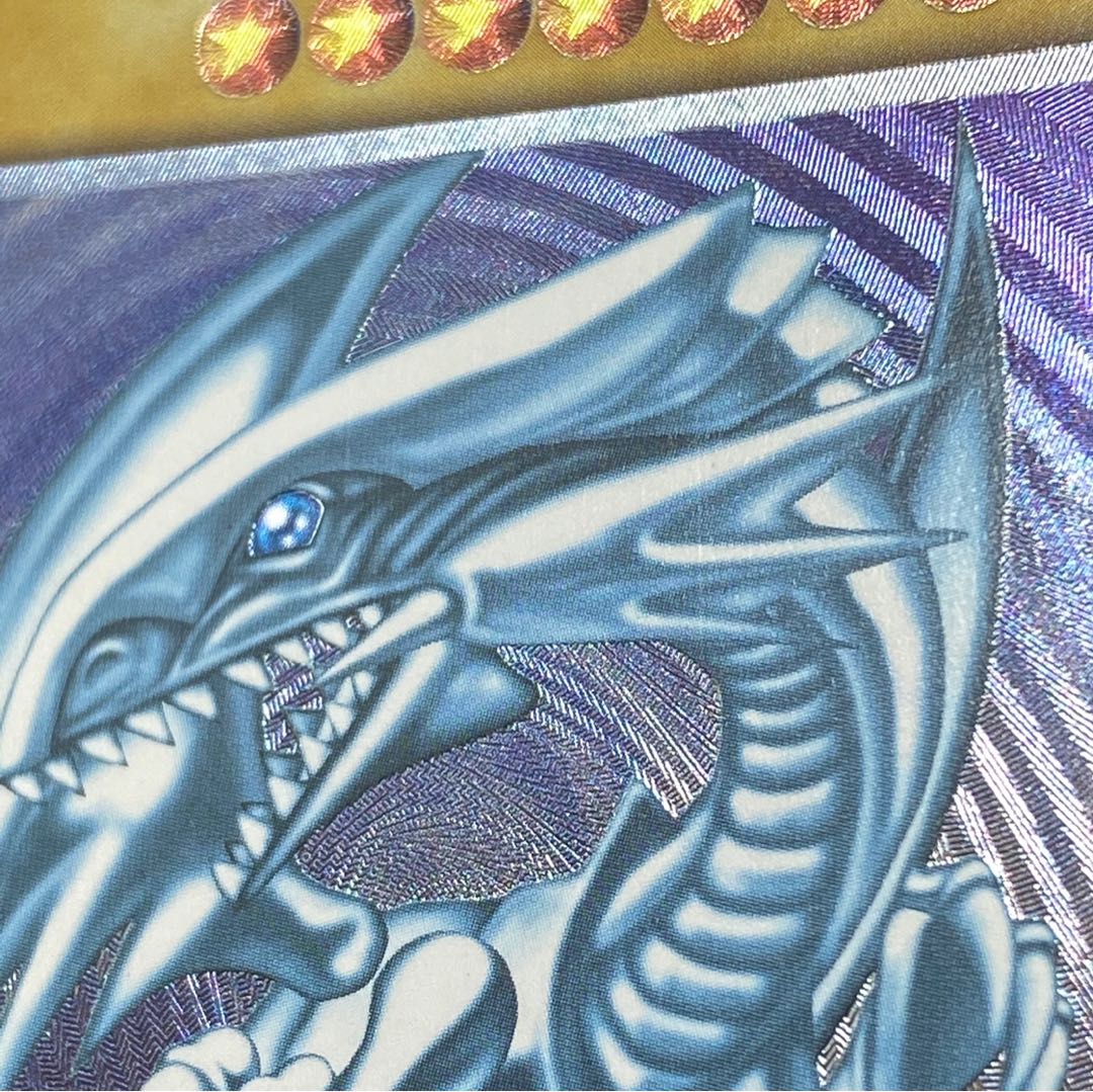 Blue-Eyes White Dragon relief magi graded