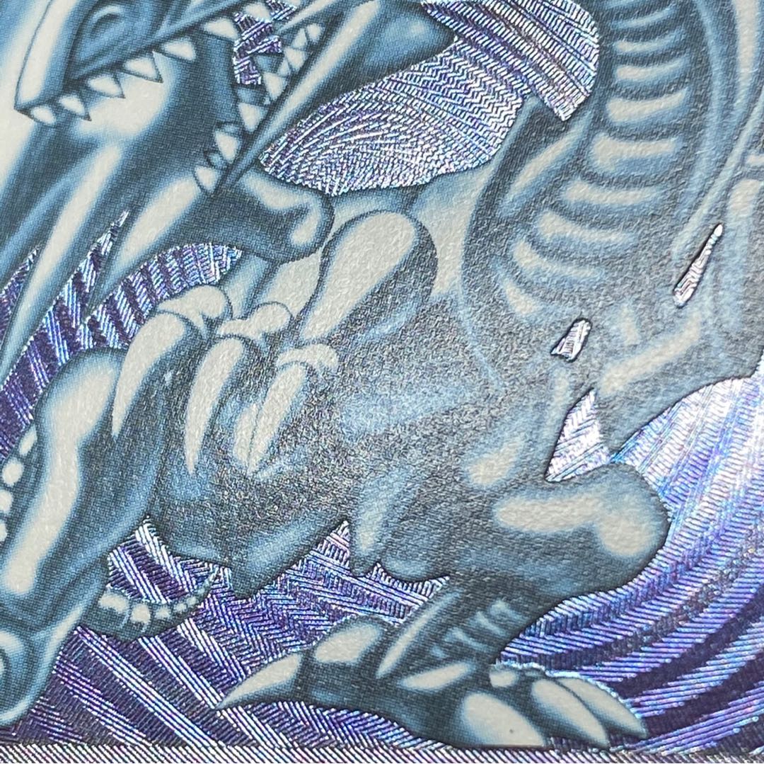 Blue-Eyes White Dragon relief magi graded