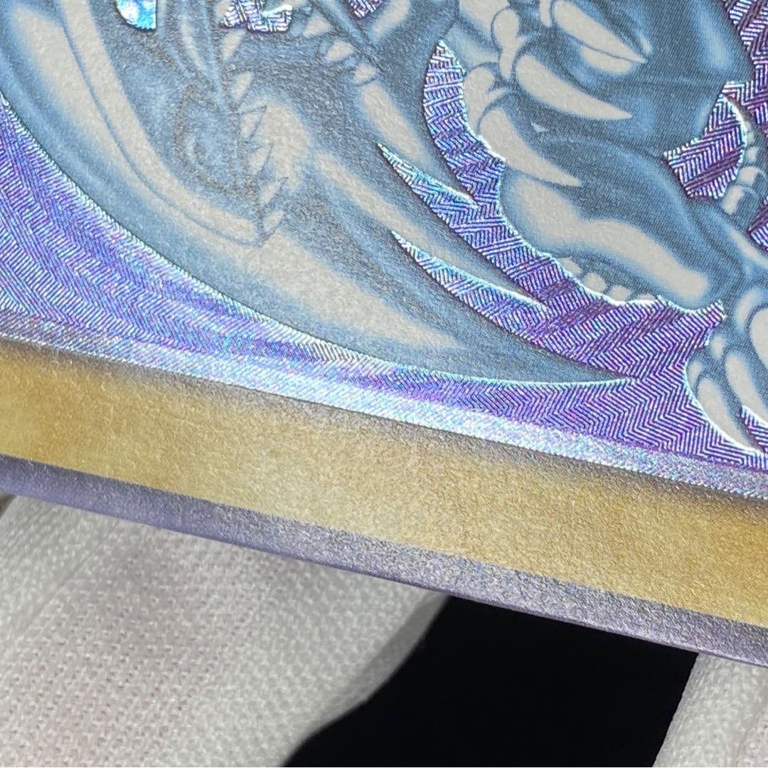 Blue-Eyes White Dragon relief magi graded