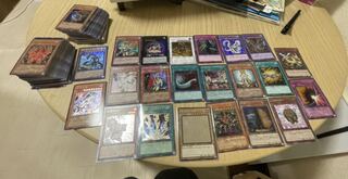 Red-Eyes Black Dragon Holo Prissiqs, about 200 cards, retired.