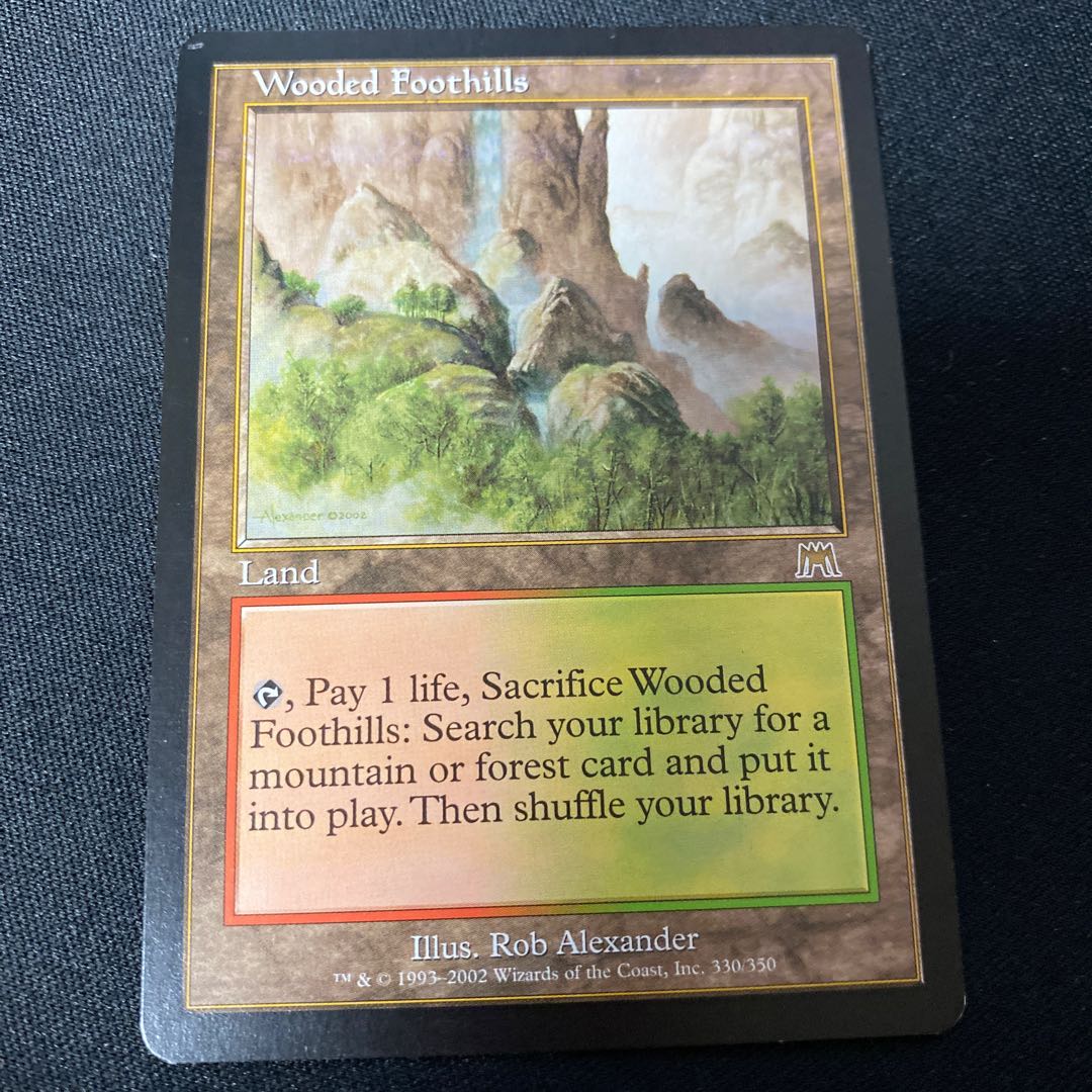 樹木茂る山麓 ONS 英語版