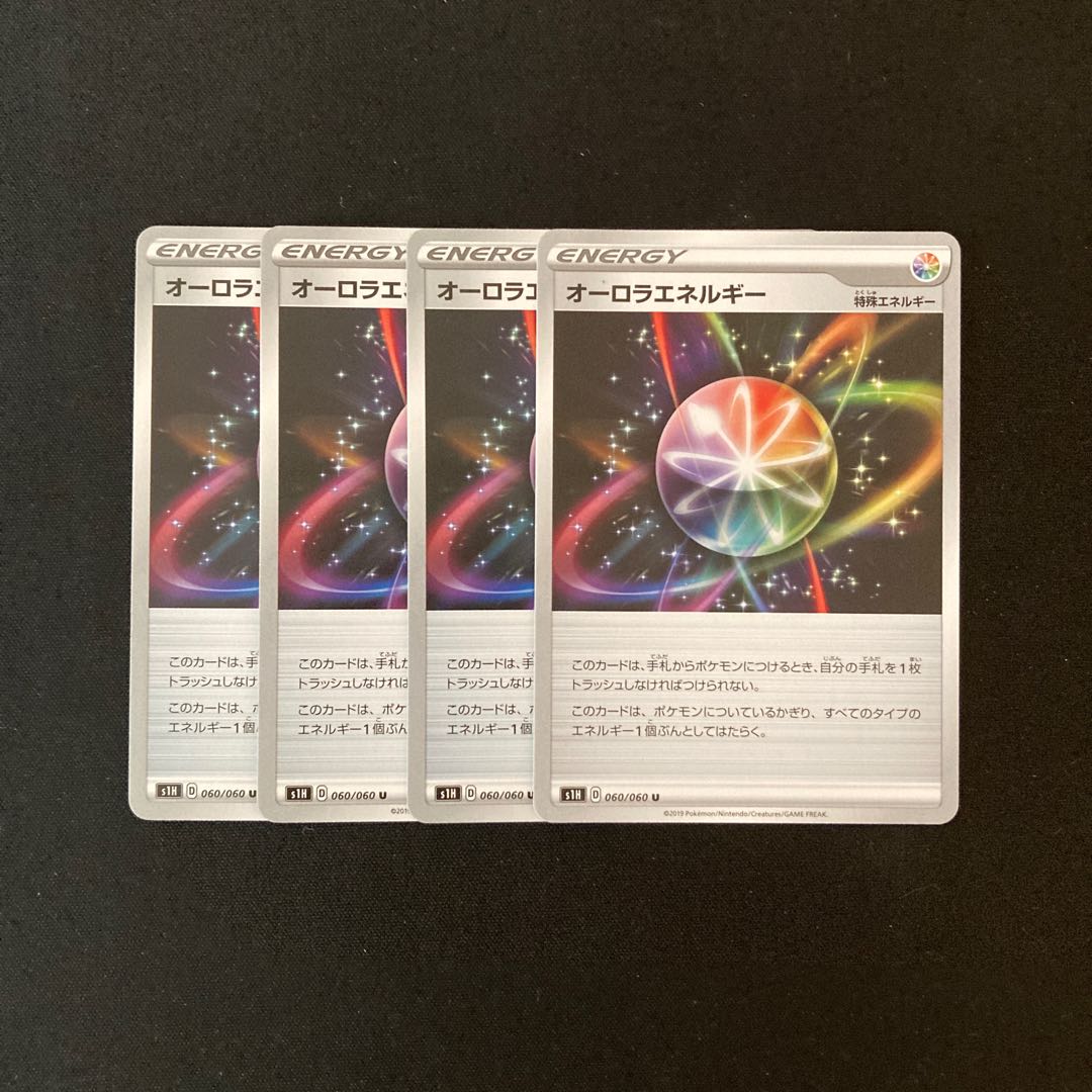 e201 AuroraEnergy s1H set of 4 Pokémon Treasurer