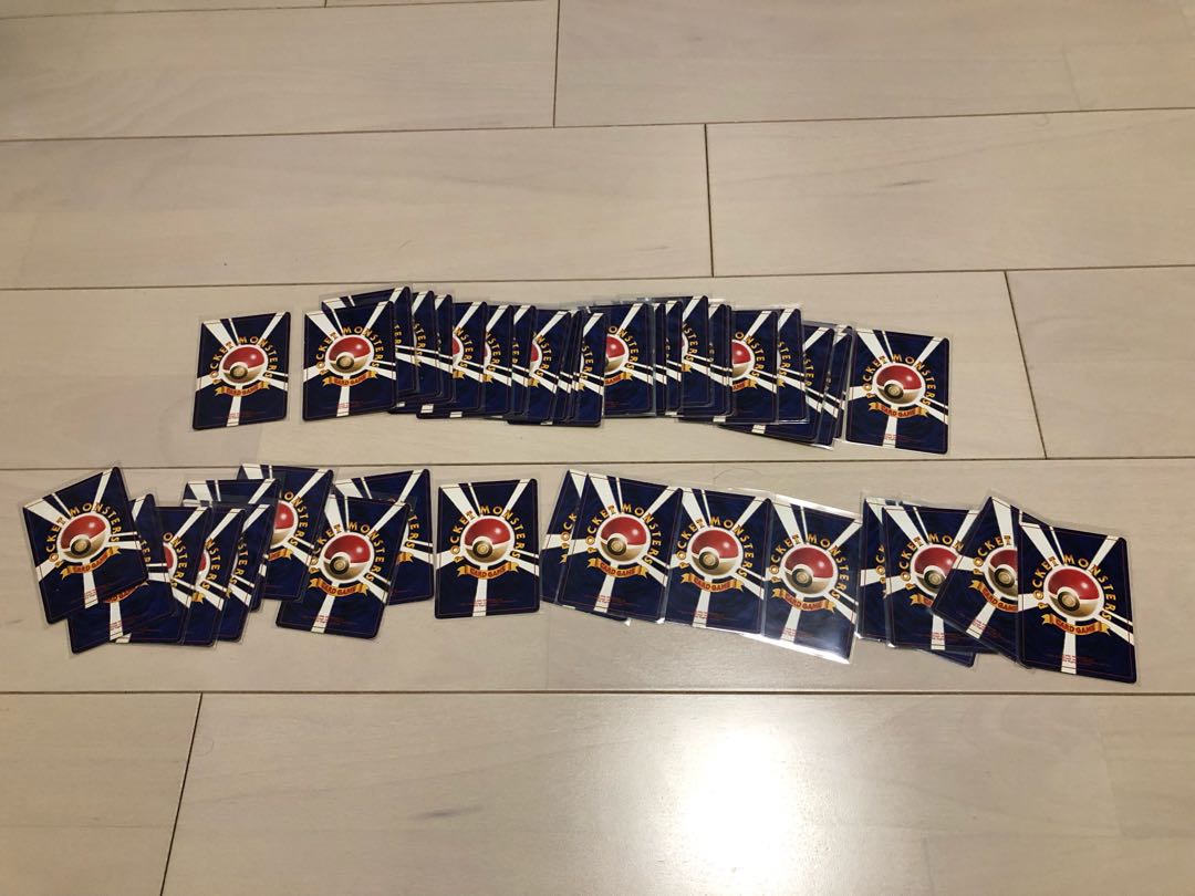 Pokémon cards, old back side, first edition, unmarked, 52 cards, sold in bulk