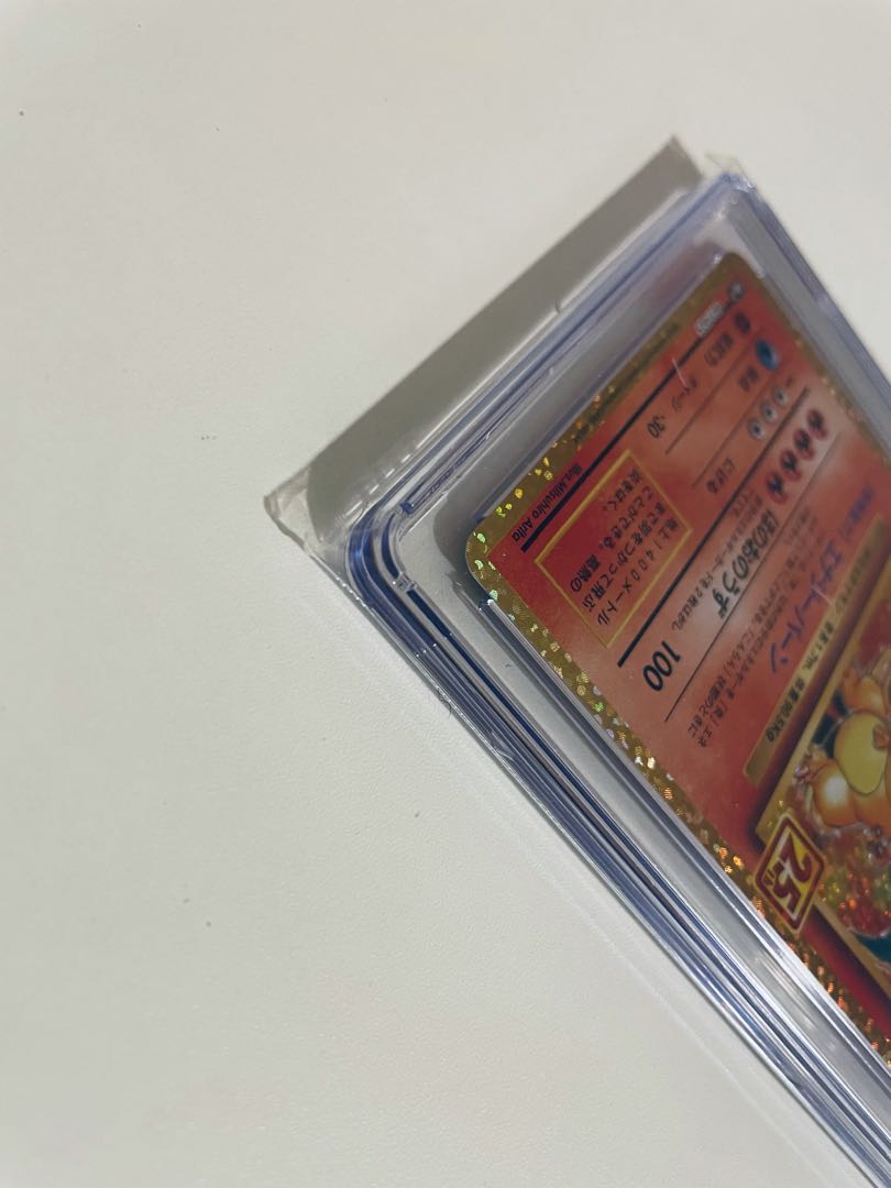 Pokemon 25th Anniversary Charizard 001/025 CGC9.5