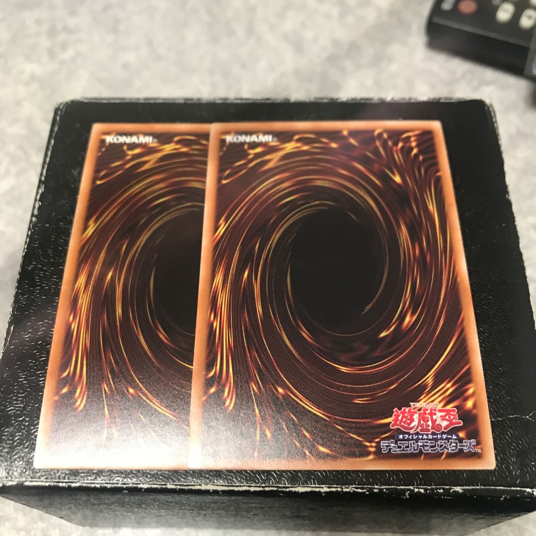 Two Qliphort Genius Super Rares