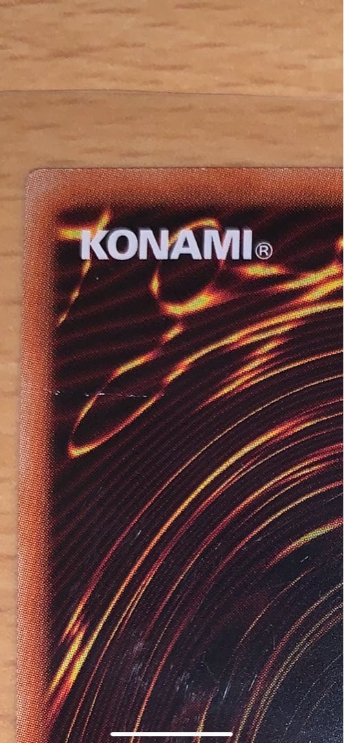 Ruddy Rose Dragon, one prismatic secret rare, and two others.