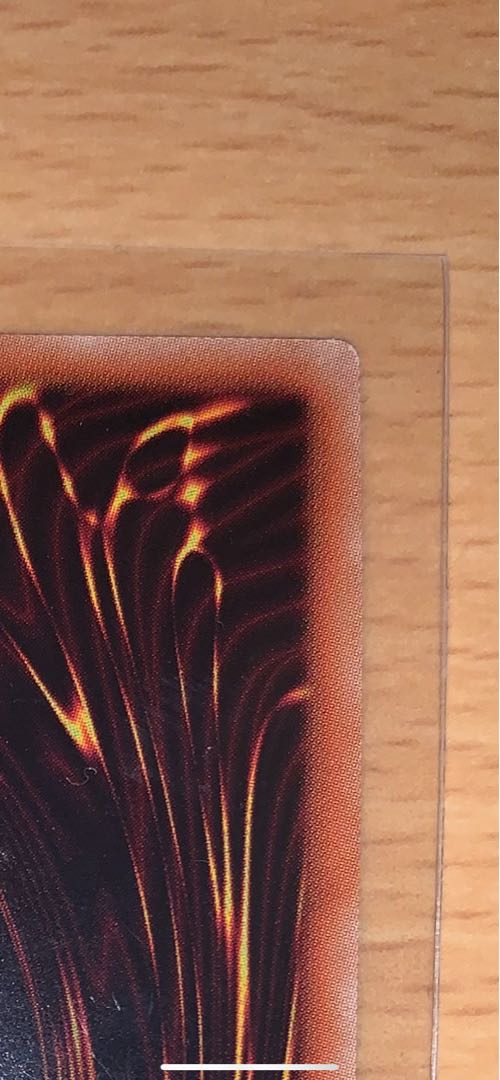 Ruddy Rose Dragon, one prismatic secret rare, and two others.