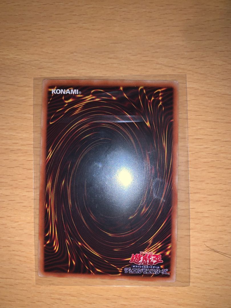 Ruddy Rose Dragon, one prismatic secret rare, and two others.