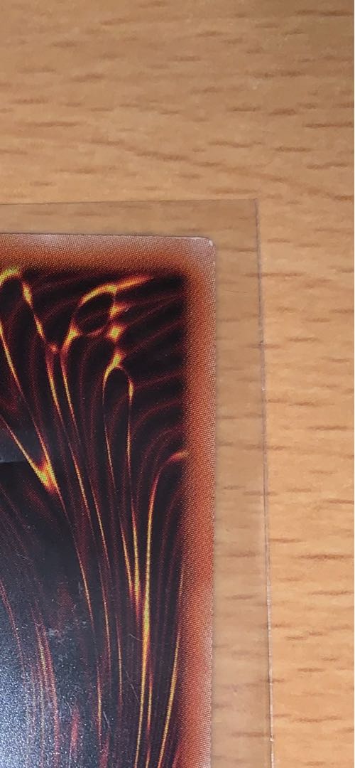 Ruddy Rose Dragon, one prismatic secret rare, and two others.