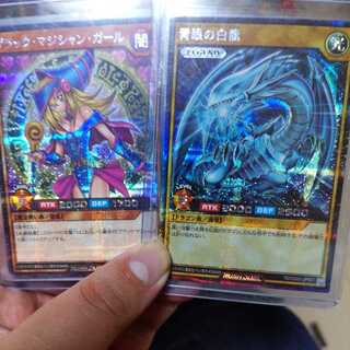 Yu-Gi-Oh Snubbull Eyes Secret Rare and Black Magician Girl Secret Rare