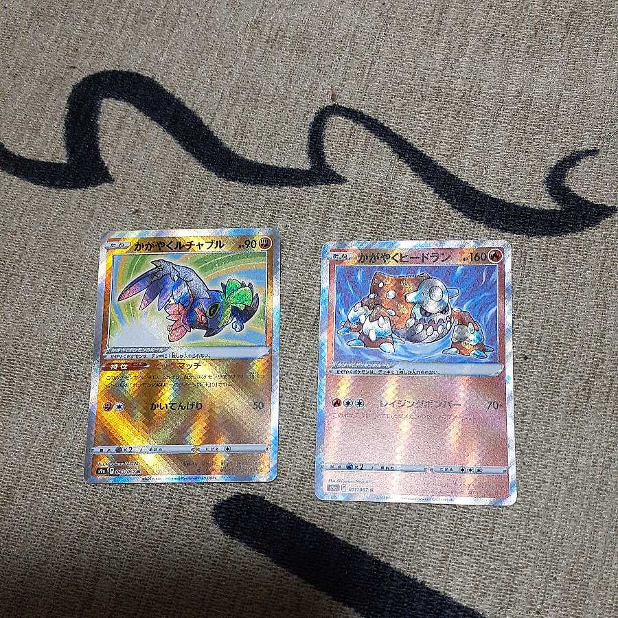 Kagayaku Hawlucha and Kagayaku Heatran