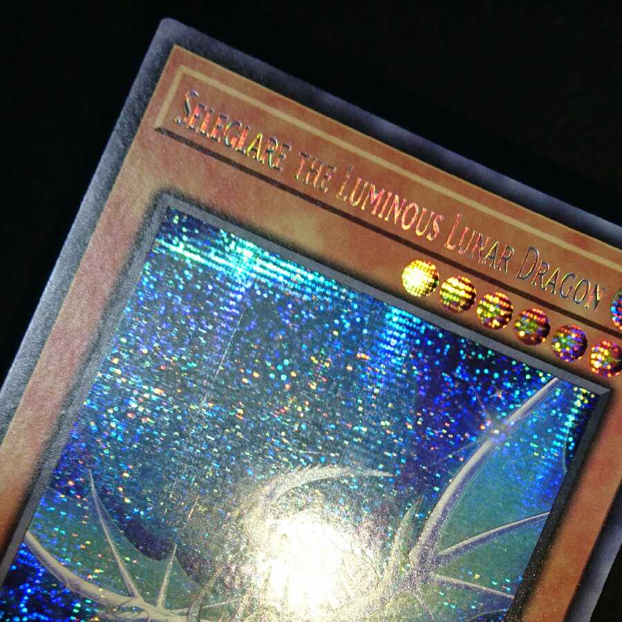 Seleglare the Luminous Lunar Dragon English Prismatic Secret Rare