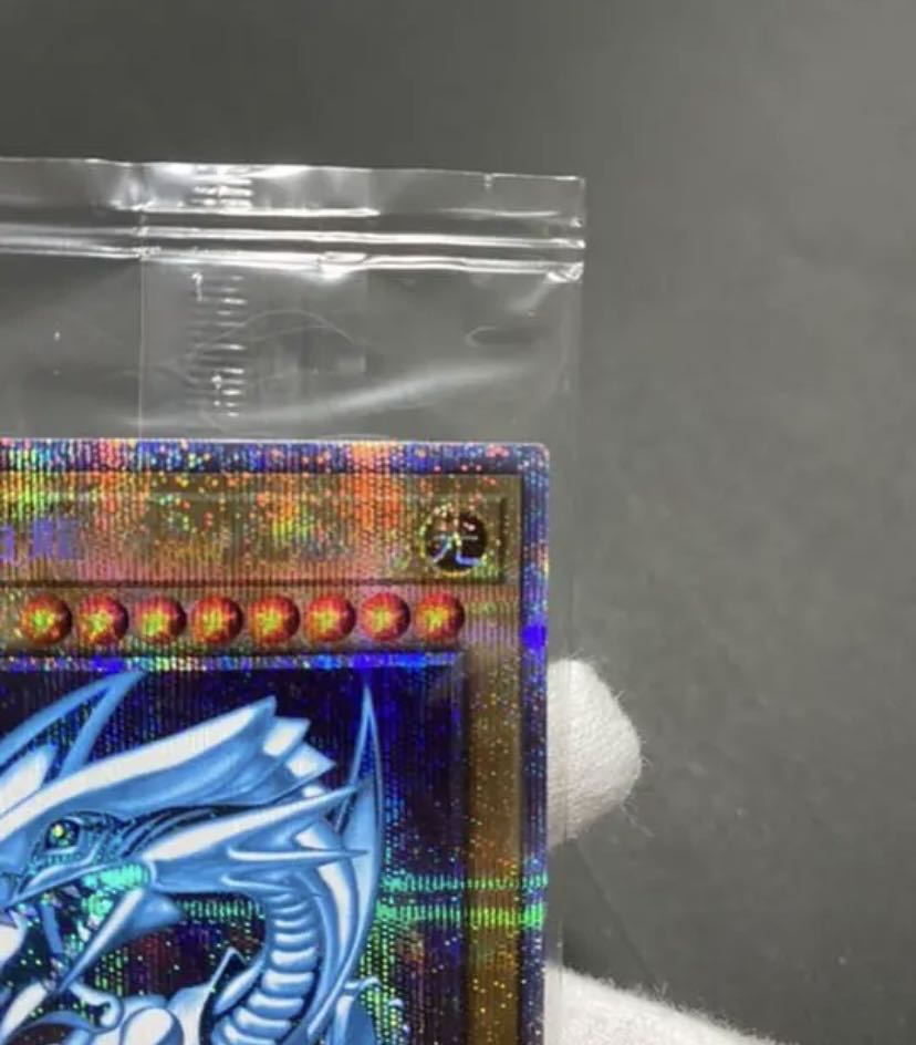 OCG Collector's Exclusive Blue-Eyes White Dragon Plissik