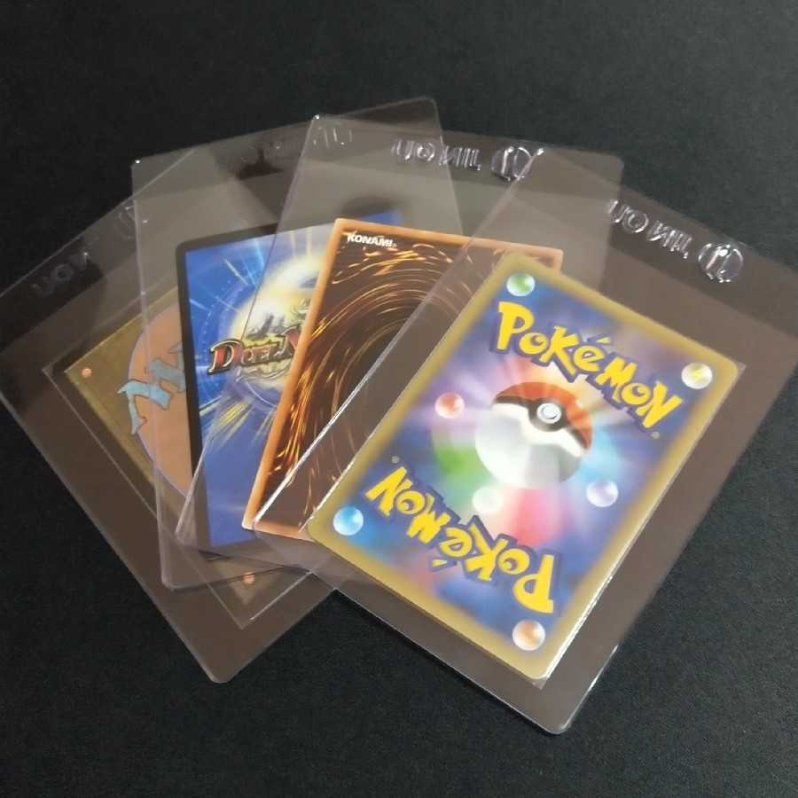 Magnet loader with extras, 35pt card pro tekter top loader, extras, card saver.