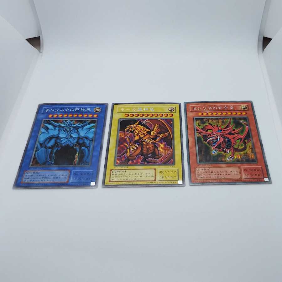 Three Phantoms Obelisk the Tormentor Slifer the Sky Dragon The Winged Dragon of Ra