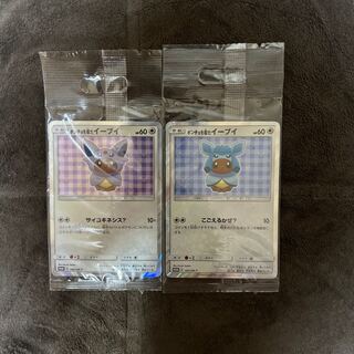 Eevee PROMO 140/SM-P in poncho PROMO 143/SM-P