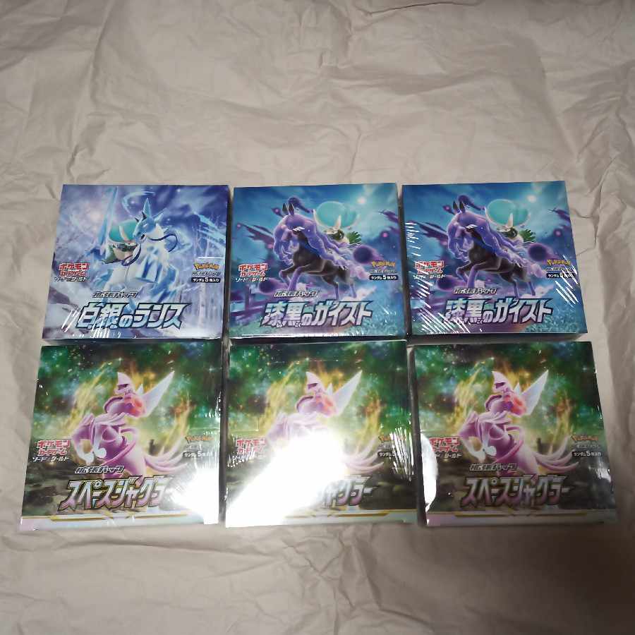 Shrink-wrapped Jet-Black Geist, White-Silver Lance, Space Juggler, 6 boxes total.