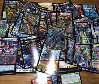 DUEMA normal and about 2000 rare cards sold in bulk with freebies.