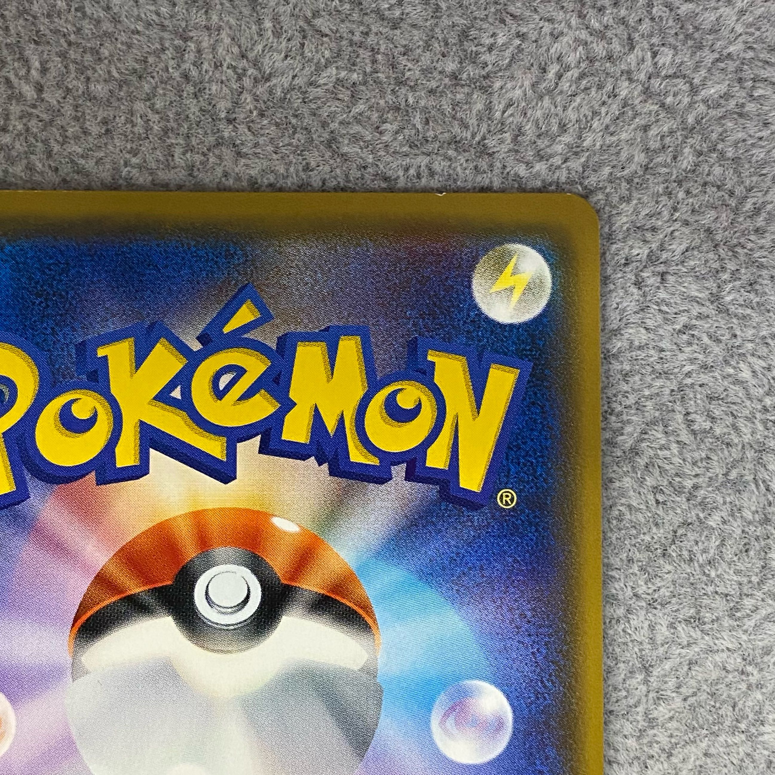 Pikachu PROMO 211/SM-P with cherry blossom afro