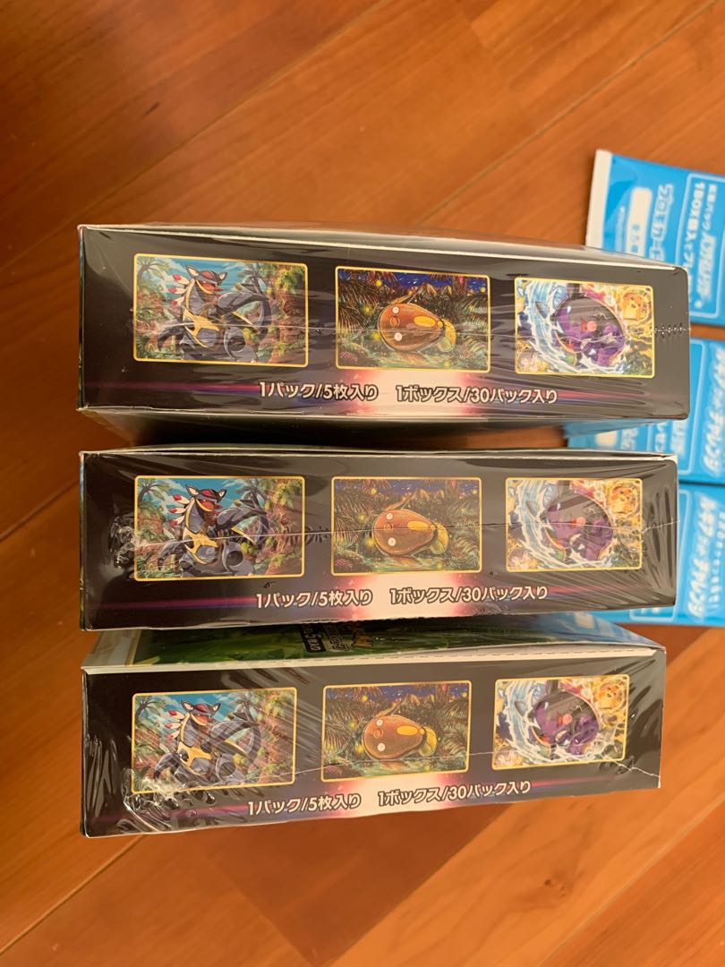 Paradigm Trigger 3 boxes with shrink-wrapped promo cards