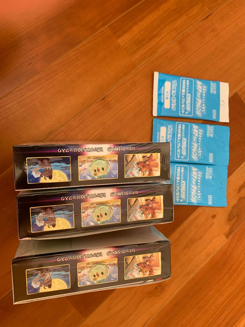 Paradigm Trigger 3 boxes with shrink-wrapped promo cards