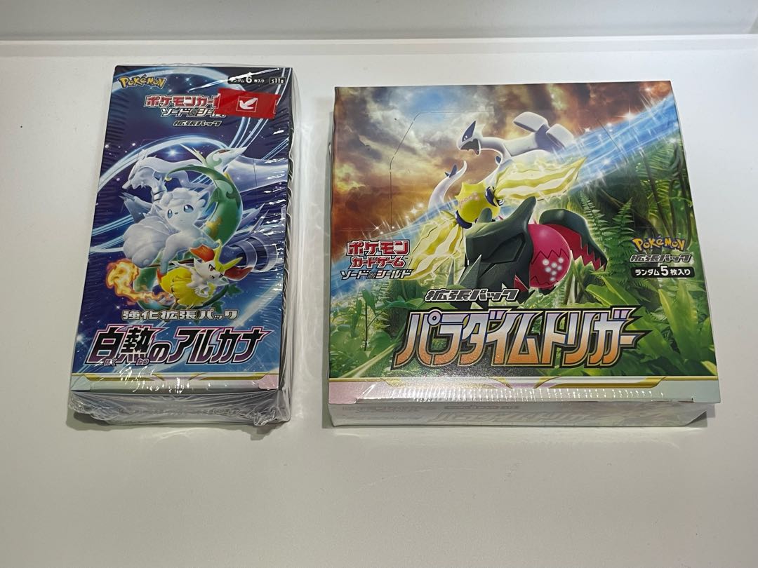 Pokémon Cards - 1 box of Glowing Arcana and 1 box of Paradigm Trigger with shrink.