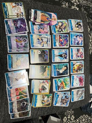 One Piece Card Romance Dawn Blue Sold as a set.