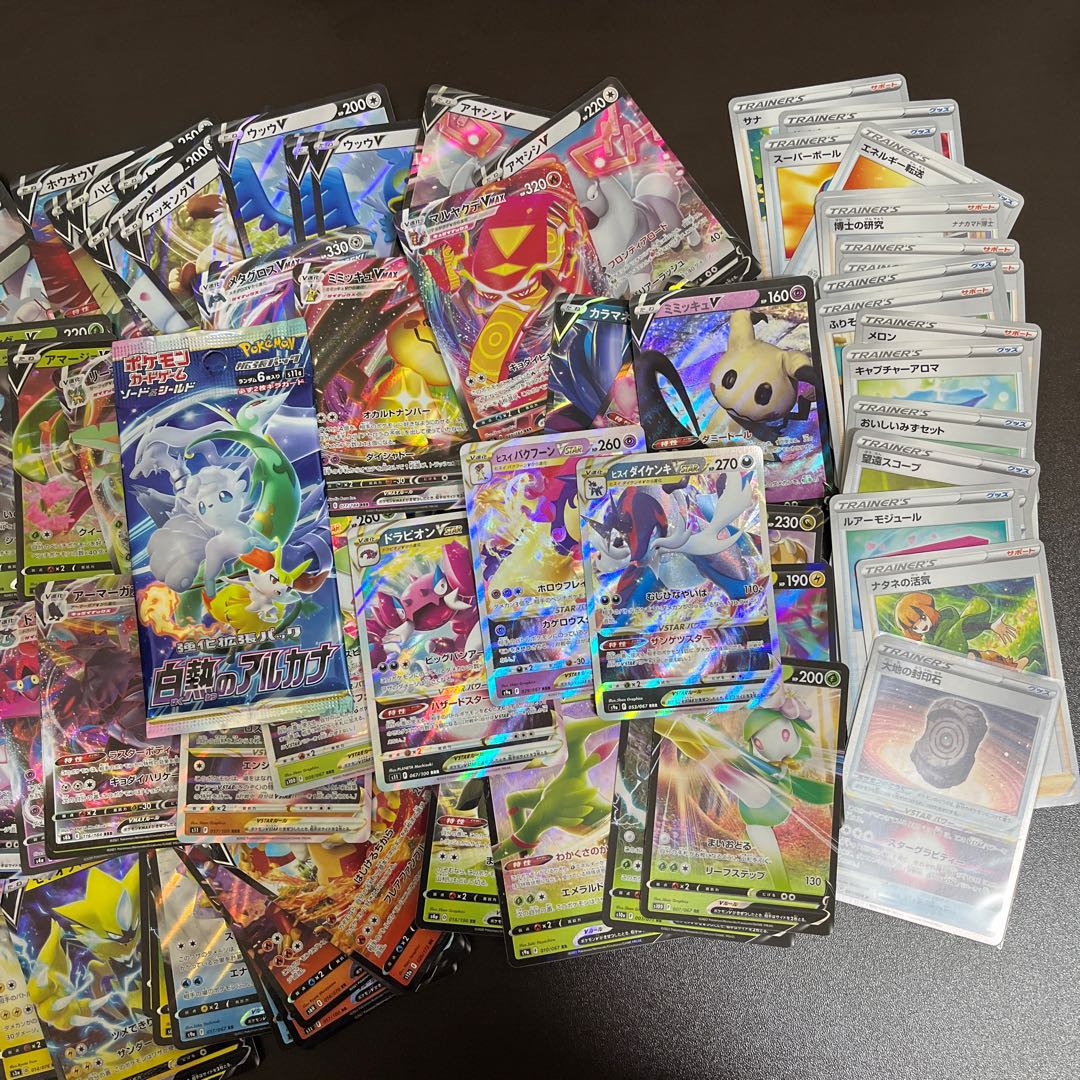 Over 100 RR, RRR, CHR, AR, etc. Large amount of extras such as white-hot arcana, sealing stones, etc.