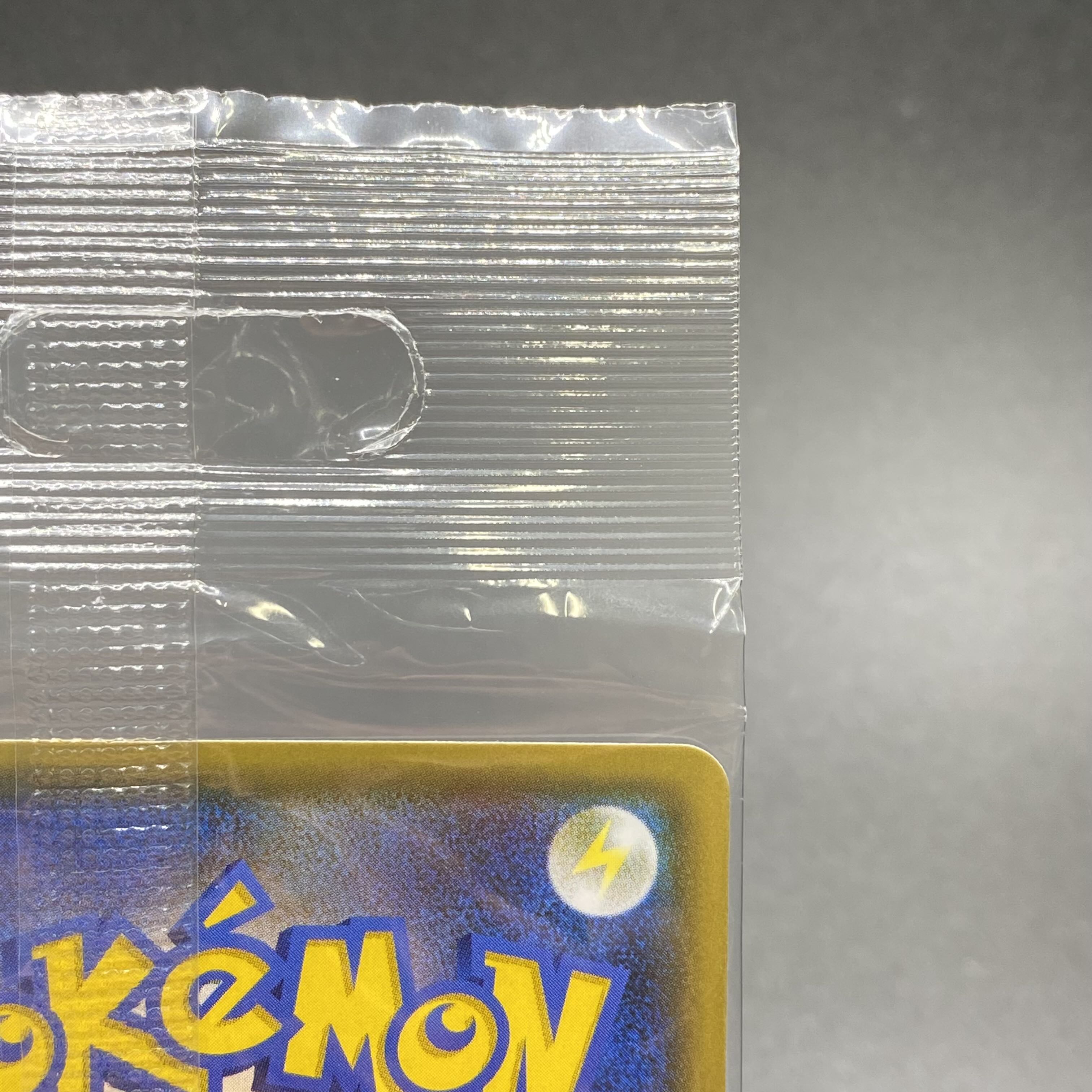 Eevee PROMO 139/SM-P in poncho, unopened.