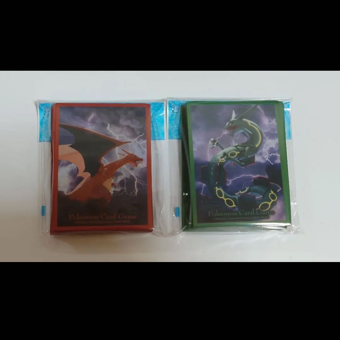 Rayquaza Charizard sleeve, new and unused