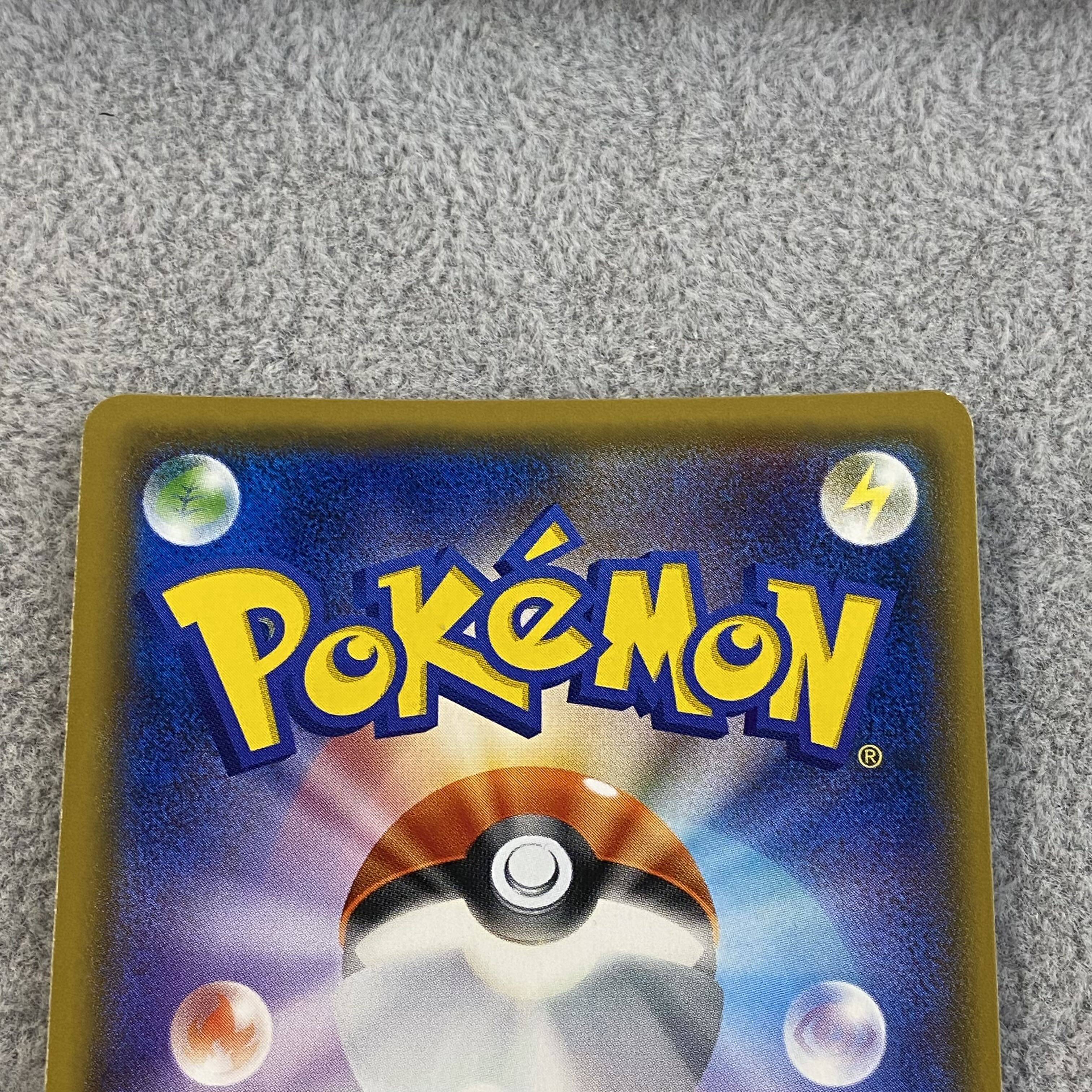 Pikachu PROMO 211/SM-P with cherry blossom afro